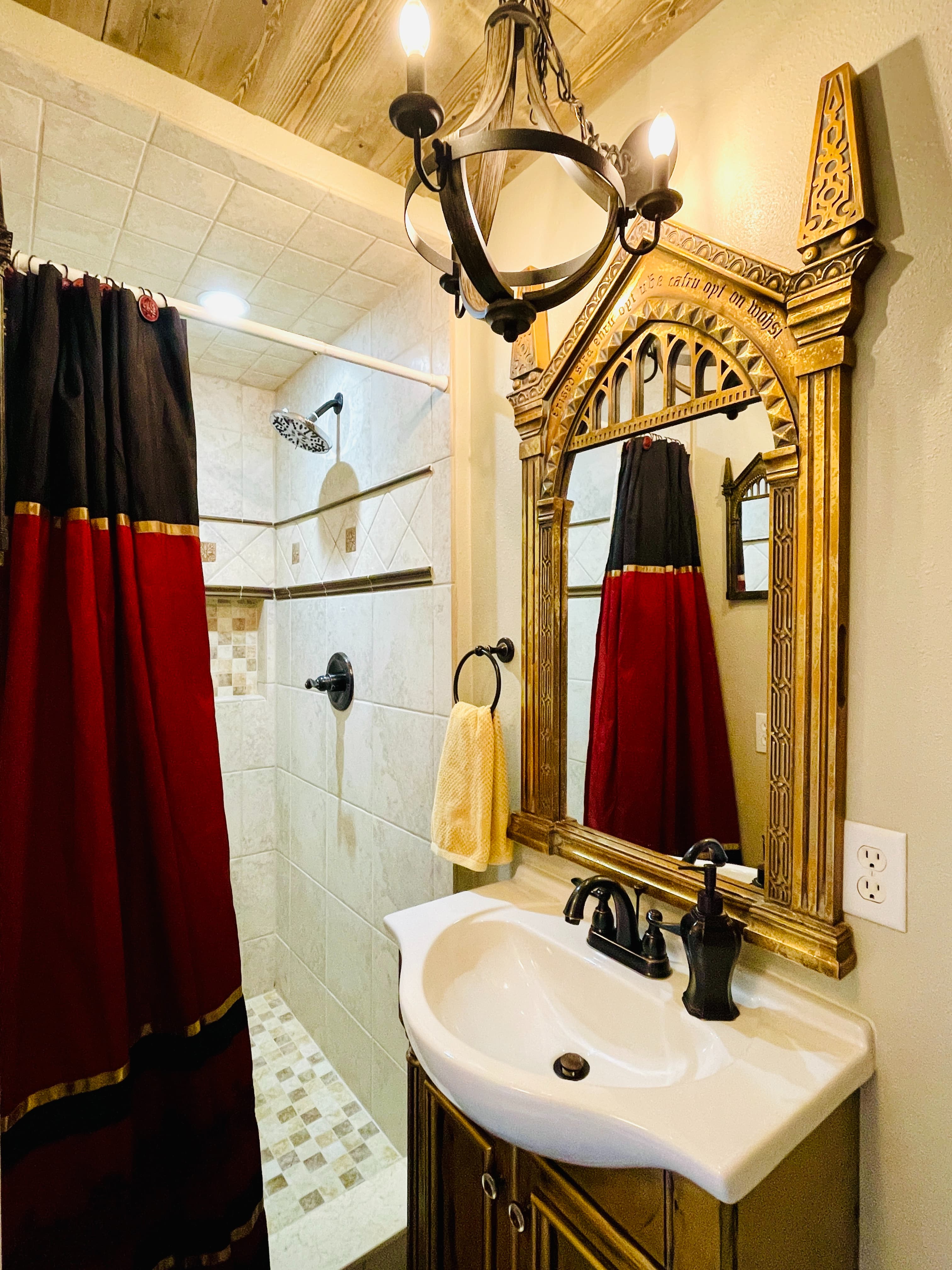 Nearby, the HARRY POTTER Gryffindor bathroom has a stand-up shower.