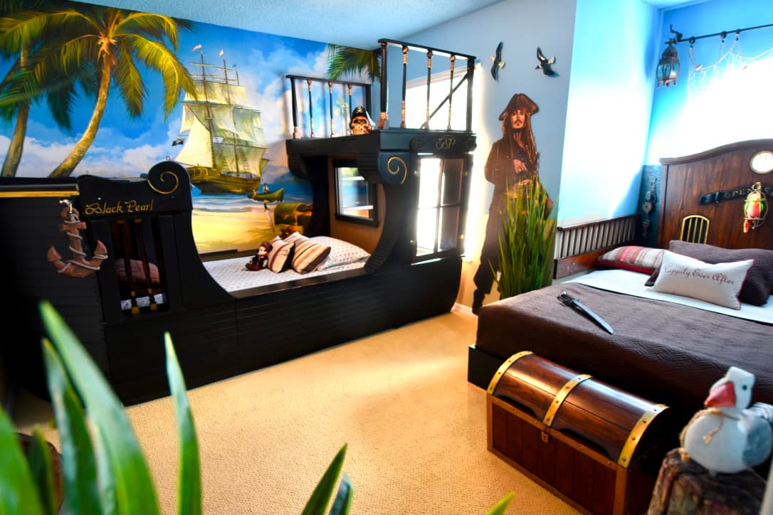 Guests of all ages love this PIRATES OF THE CARIBBEAN room, with both a twin and queen ship beds!