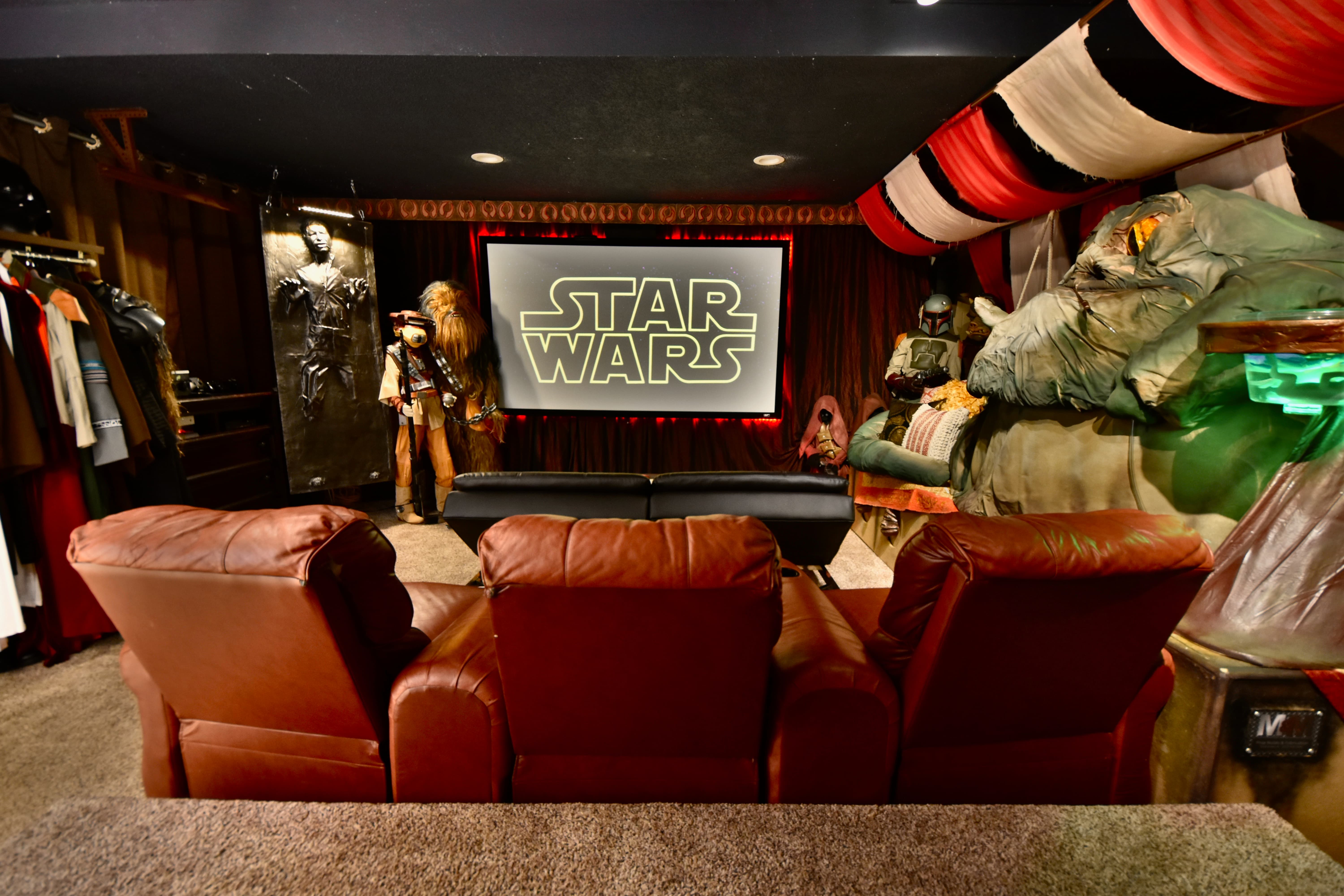 Chill-ax in the iconic scene from  STAR WARS' "Return of the Jedi"  in this over-the-top media room with recliners and an 8ft wide theater screen!  Main level.