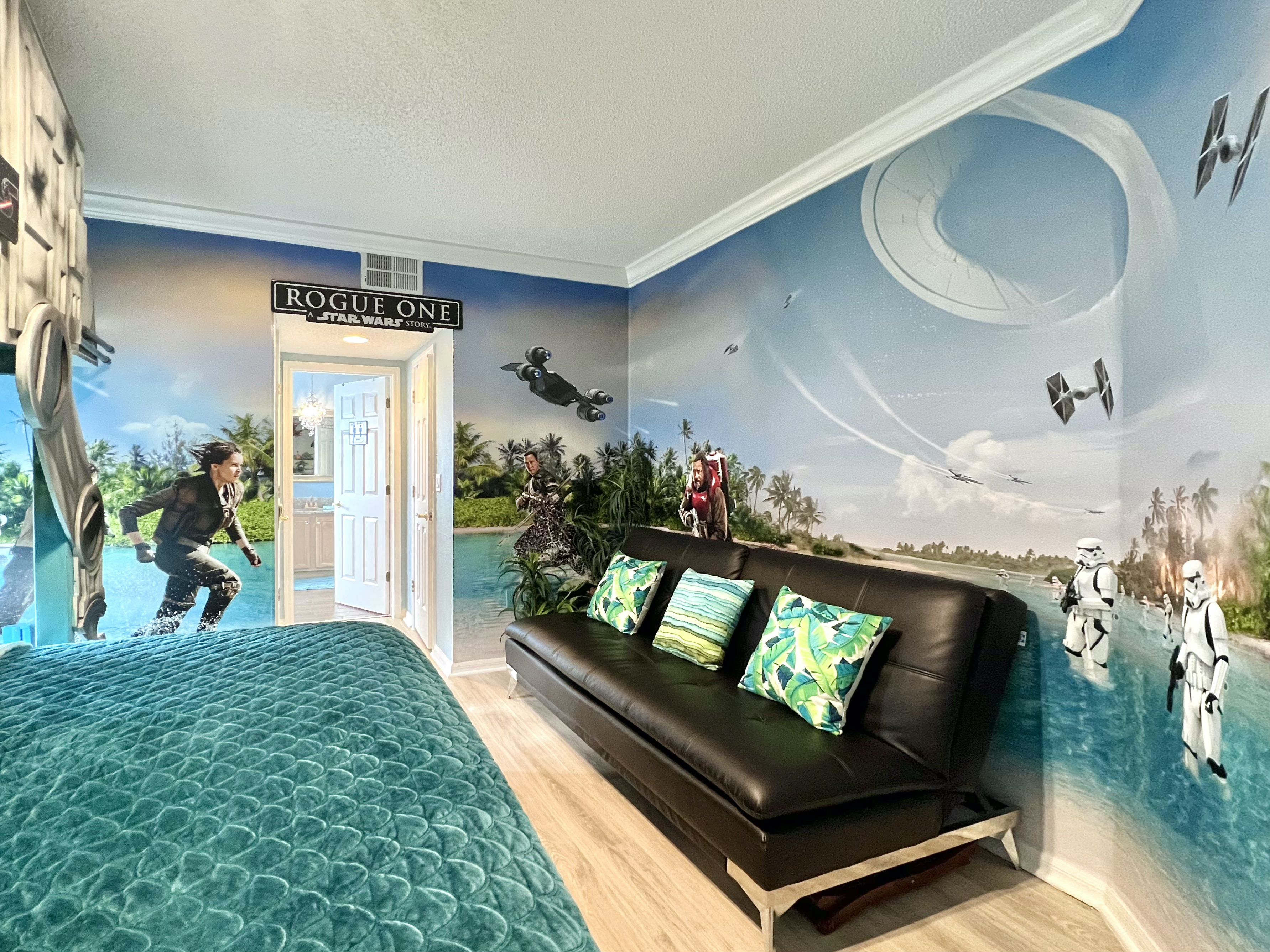 Including this full-sized fold-out futon bed, a family of FIVE plus baby can share this STAR WARS familybedroom!