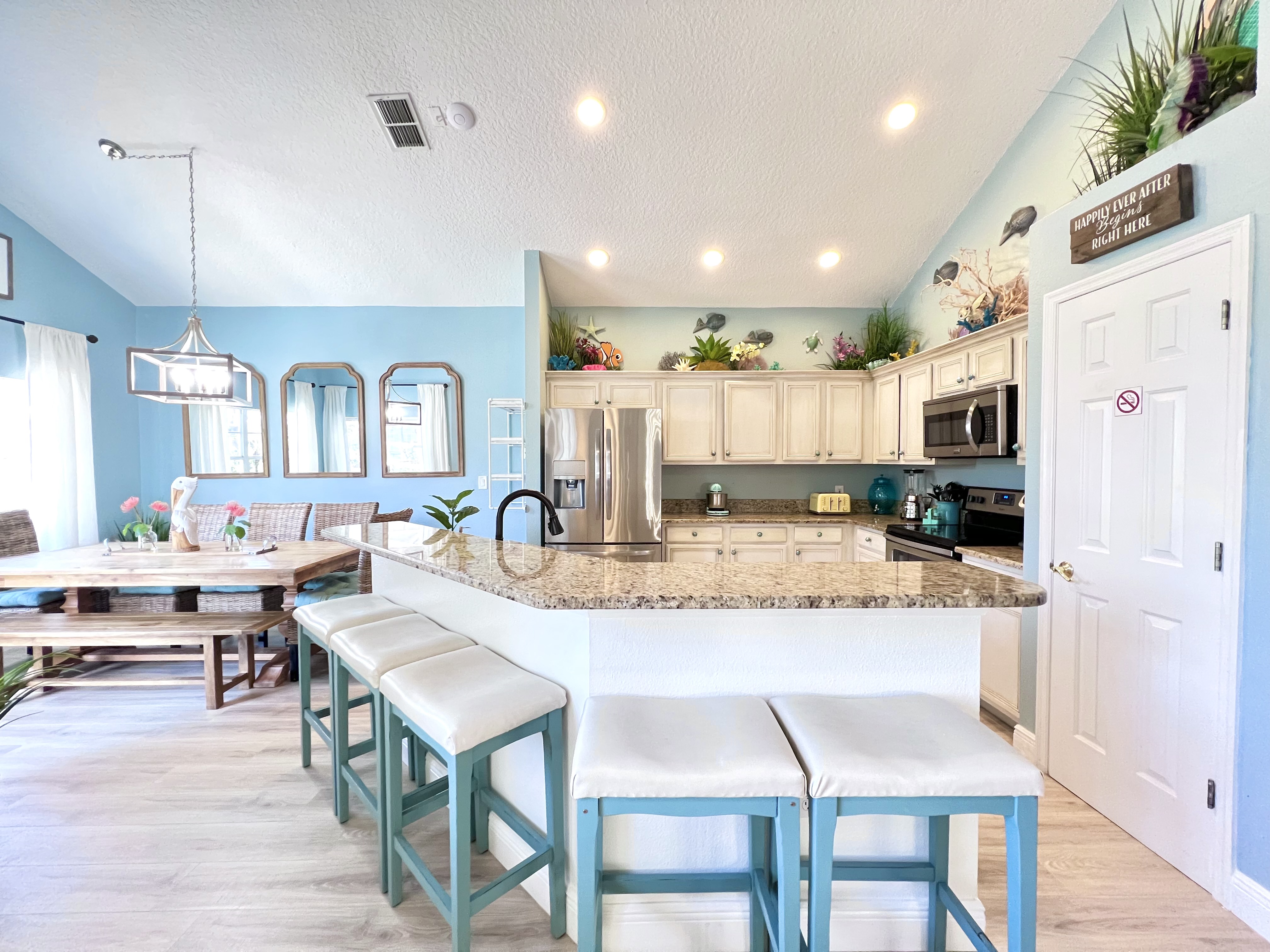 Seat up to 10 at the kitchen dining area, with five more at the bar! Baby chair available.