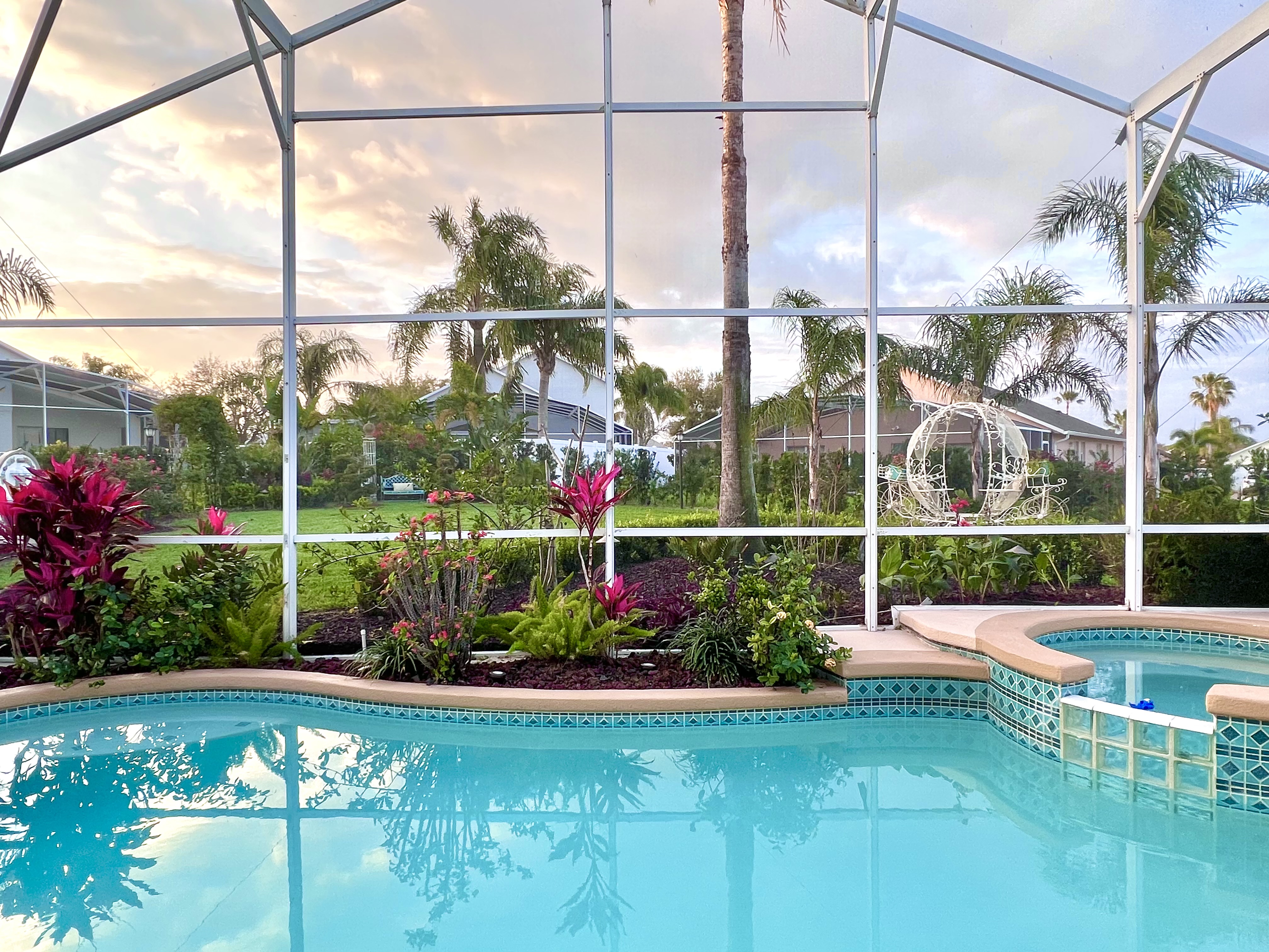 Aqua-blue pool and spa with beautifully manicured tropical flower gardens on a huge, private property is the "Happily Ever After" vacation you deserve, and won't find ANYWHERE else in a moderately-priced rental!!!
