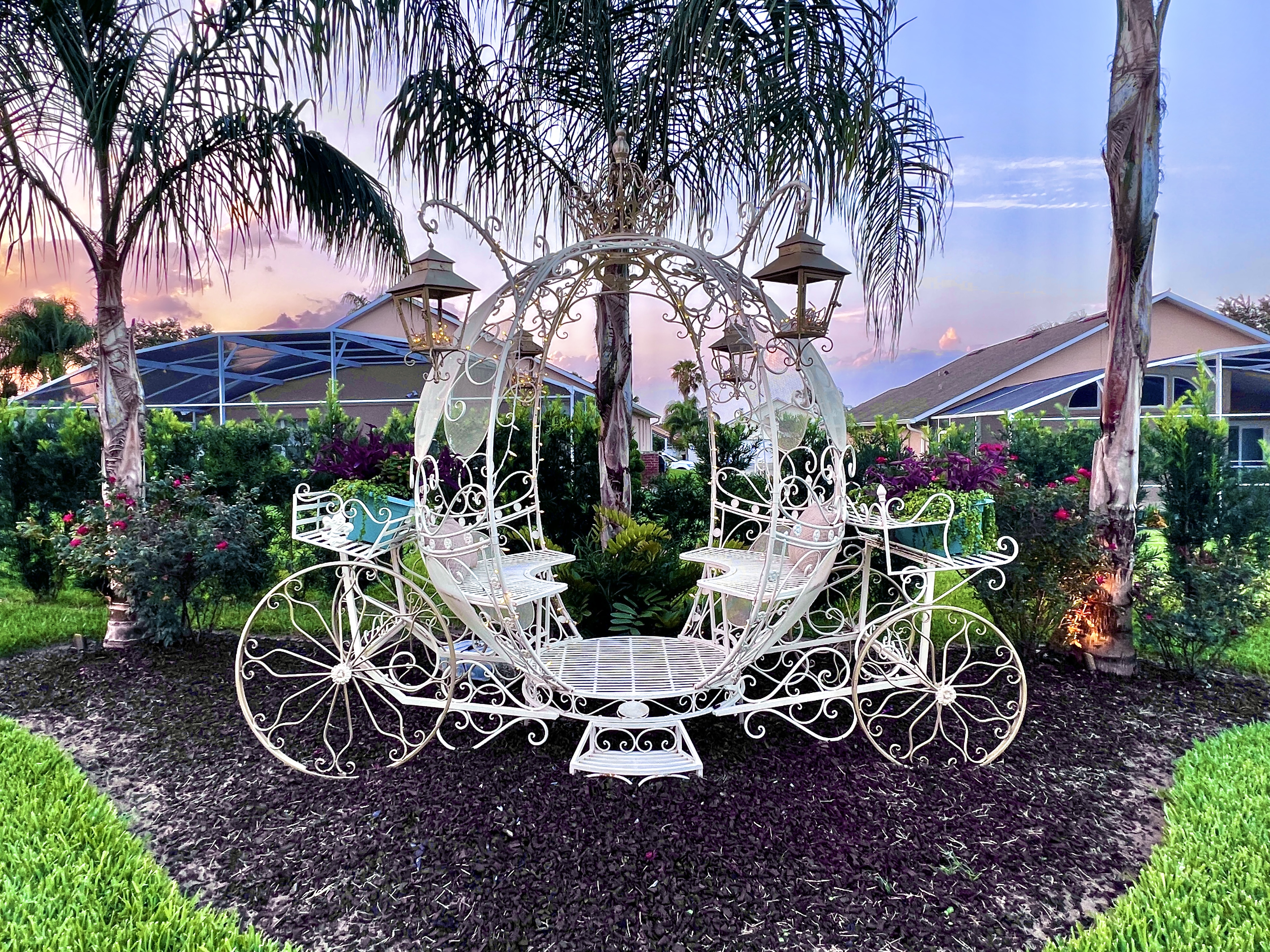 CINDERELLA's life-sized carriage is outside in the beautiful flower and palm tree gardens.  Find princess and prince costumes for the coolest family pics EVER!!!