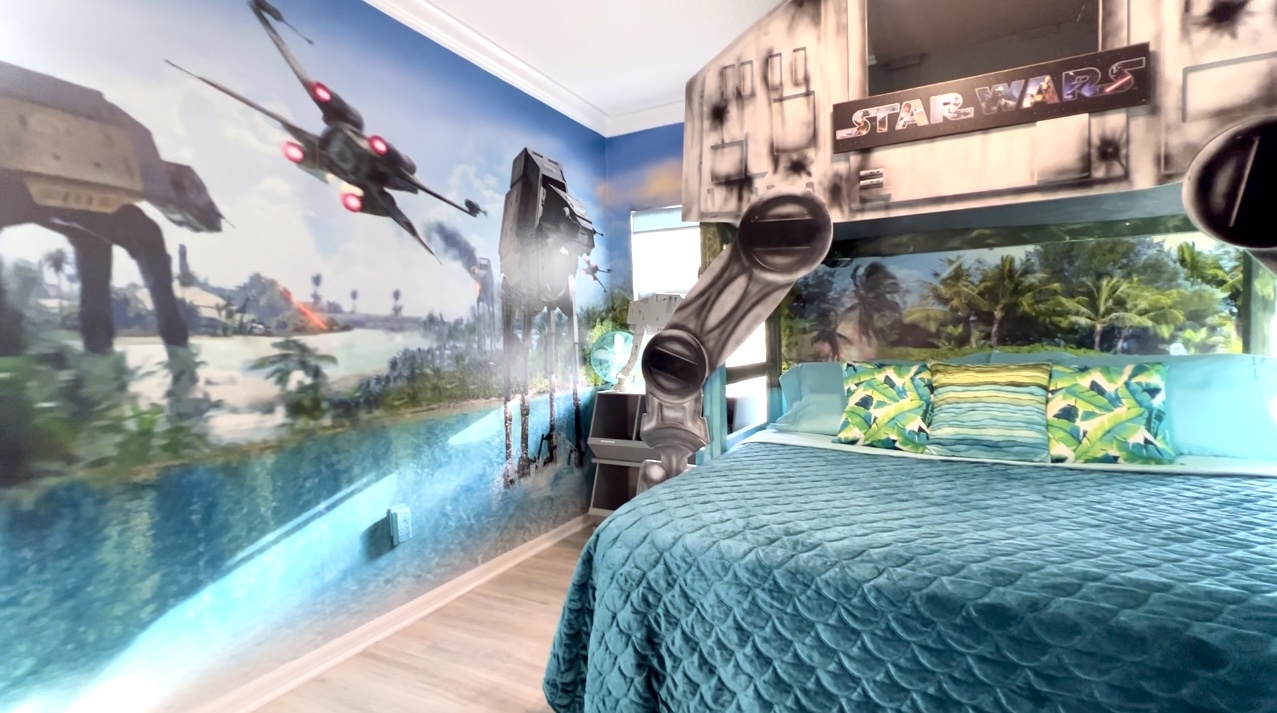 The walker has a solid ladder and a twin bed in its belly, to sleep a stowaway trooper!